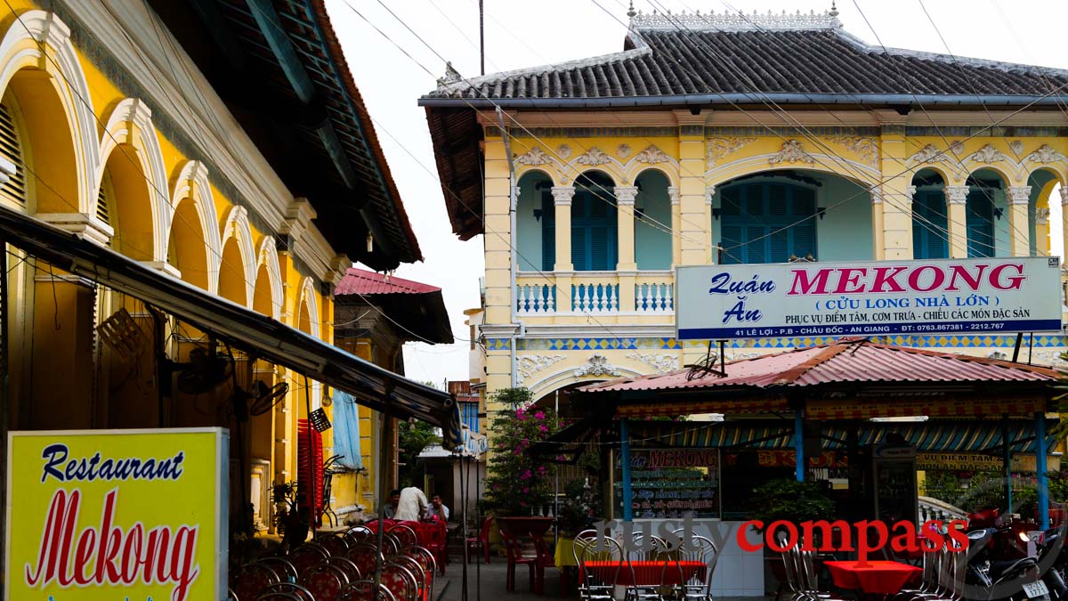 Mekong Restaurant, the family home and Le Cong Bich's ancestral worship house on the left.